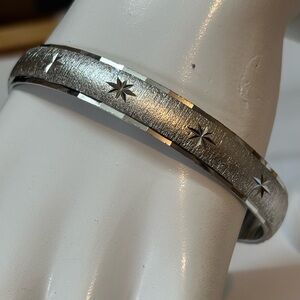 Monet Diamond cut Silver-tone Bangle Bracelet